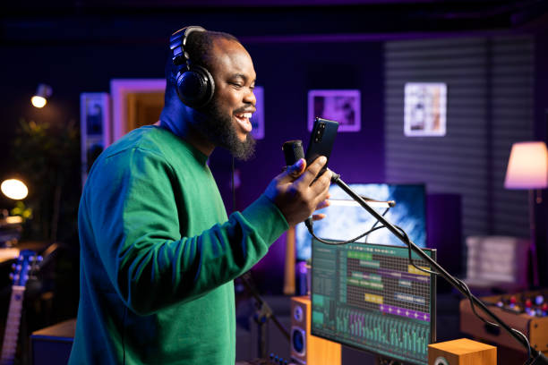 istock Pleased artist does a recording session in home studio with professional gear 2155970546