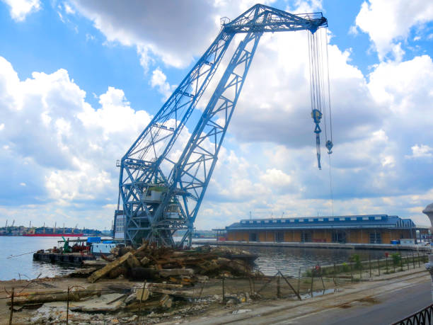 Heavy Lifting Crane against the sky and clouds in Cuba