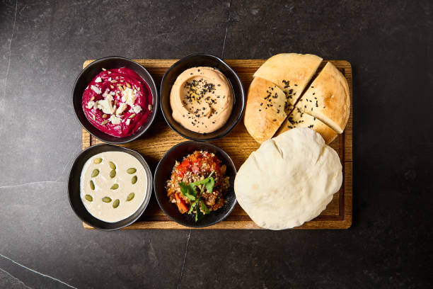 istock Assorted Dips with Pita and Flatbread: Hummus, Beetroot Hummus, Tonatto Sauce, Ajapsandali 2155972104