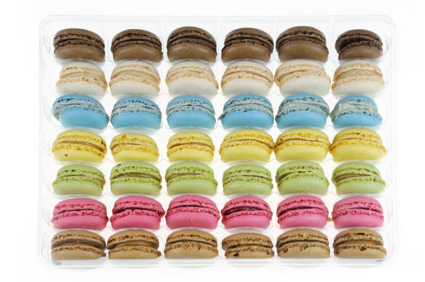 istock Colorful macarons isolated on the white background 2155972419