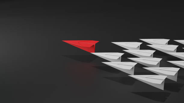 istock Leadership concept, red leader plane leading white plane, on dark background. 2155972941