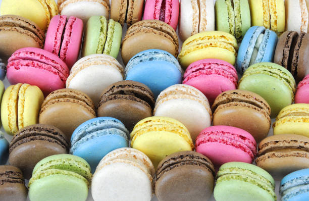 istock close up on colorful macarons arranged in row 2155972951
