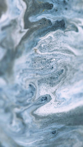 istock Sparkling ink drip marble texture gray white blue 2155974029
