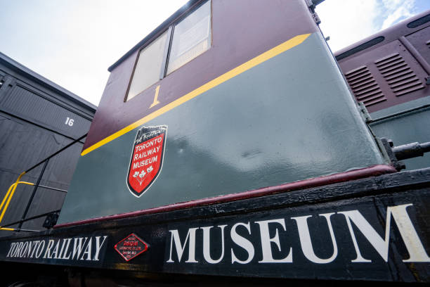 National Railway Museum, York, English, British- 24 Feb 2016: Midland Railway Society Midland Crest logo on the red train carriage exhibition in the Great Hall museum resembling train station