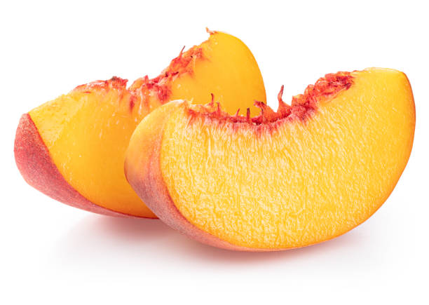 istock Ripe peach slices on white background. File contains clipping path. 2155975492