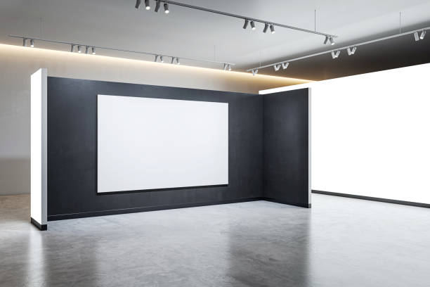 istock An empty gallery room with a large blank frame on a dark wall, modern interior style, concept of an art exhibition. 3D Rendering 2155975672