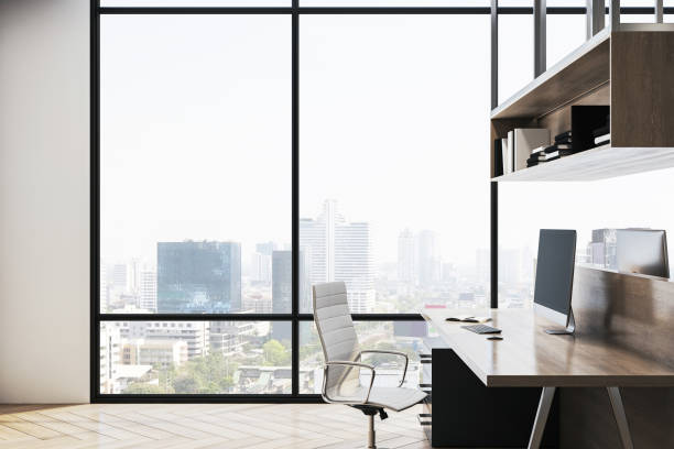 istock Modern office interior with desk, computer, cityscape view, realism style, daylight atmosphere, concept of workspace. 3D Rendering 2155975692