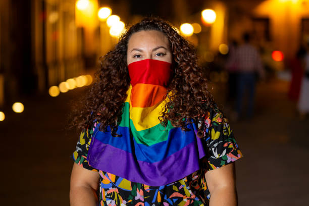 istock Proud Non Binary person with LGBTQ+ Symbols as a Face covered 2155976176