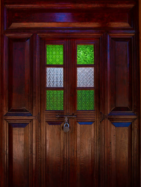 istock Wooden door with beautiful artwork. Vintage architecture 2155976554