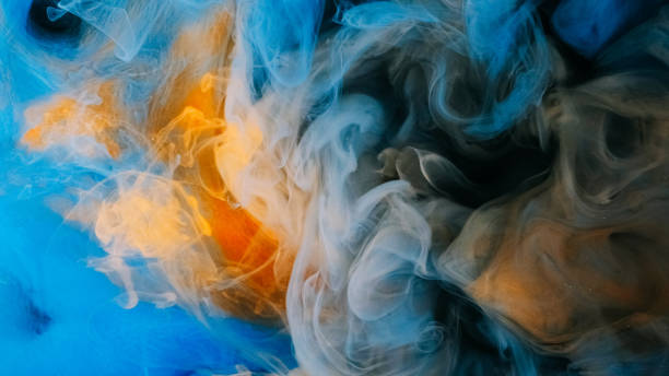 istock Ink mix water fume cloud flow blue orange wave 2155977033