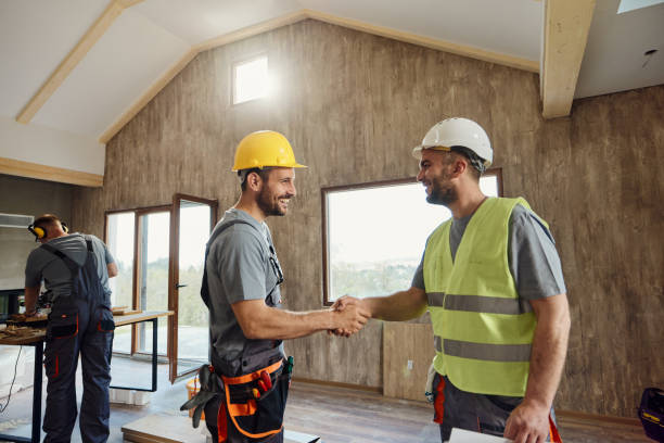 istock Happy manual workers came to an agreement during home renovation process. 2155979815