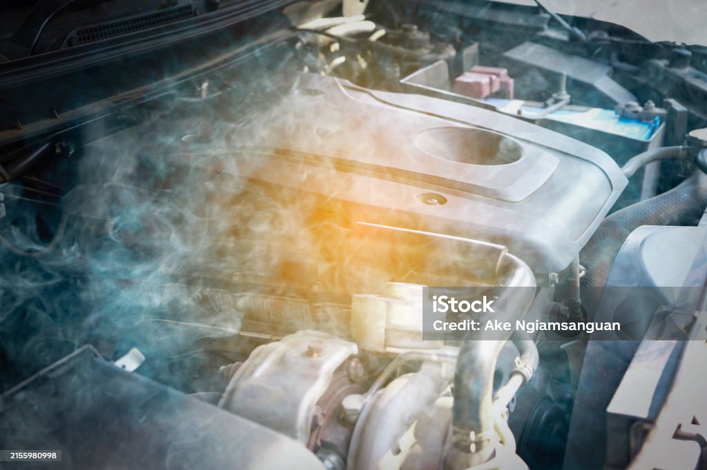 Engine Is Smoking The Cars Engine Has A Problem Car Engine Overheats And There Was Smoke ...