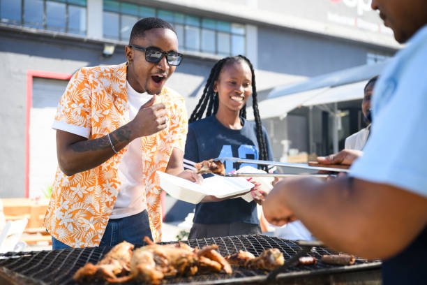 istock Excited students purchase grilled chicken from a food vendor 2155981727