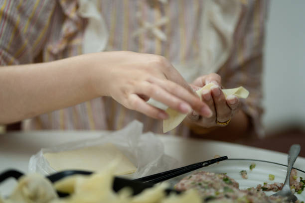 istock A housewife is making dumplings at home 2155984253