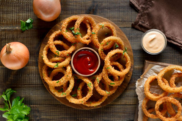 istock Onion rings with tomato sauce 2155989402
