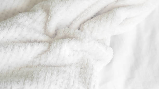 istock close up of  white bedsheet background ,good hotel service 2155991289