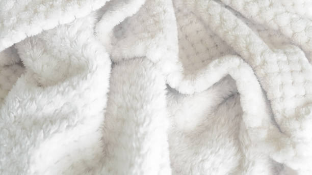 istock close up of  white bedsheet background ,good hotel service 2155991367