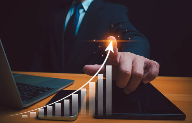 istock Businessman pointing arrow graph corporate future growth plan, Business development to success and growing growth concept, Setting goals for business growth, business marketing success. 2155992698