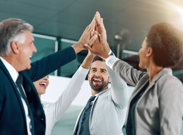 istock Group, people and diversity for success in high five for business or project as lawyer in corporate. Teamwork, celebration and workplace with happy, winning or collaboration in career as professional 2155992778