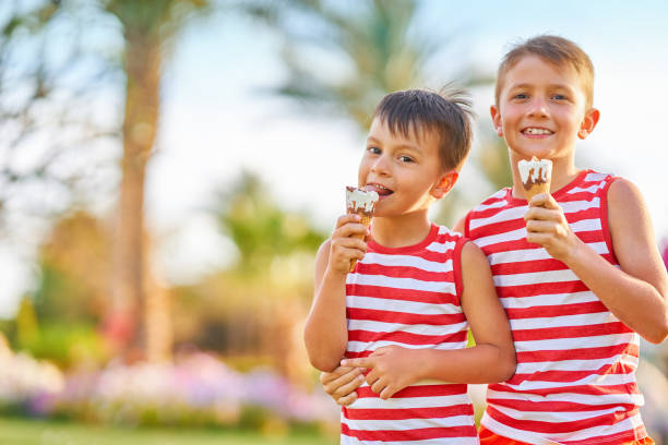 istock Picture of brothers with ice cream cone 2155993195