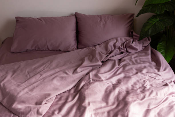 istock cotton bed linen color dusty rose messy 2155993662