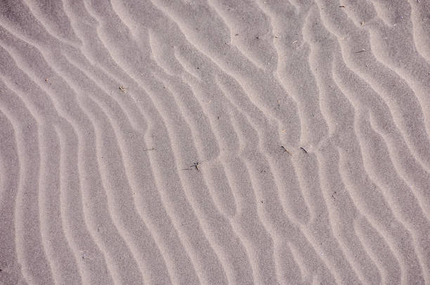 istock The sand is very fine and the waves are very small 2155994332