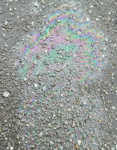 istock A trace of gasoline on the asphalt as a background. Texture 2155995801