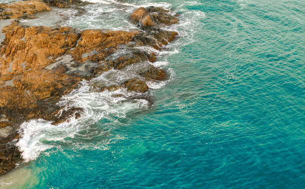 istock aerial view of rocky shore 2155996196