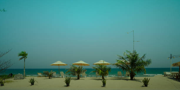 beautiful beach with umbrellas and chairs on the beach , Summer holiday background
