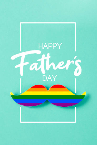 Happy Father's Day message with rainbow colored paper mustache on green background