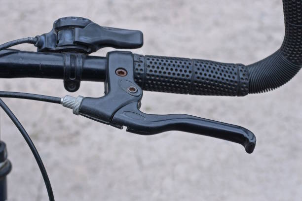 istock part of a black metal bicycle handlebar with a handbrake 2156000507