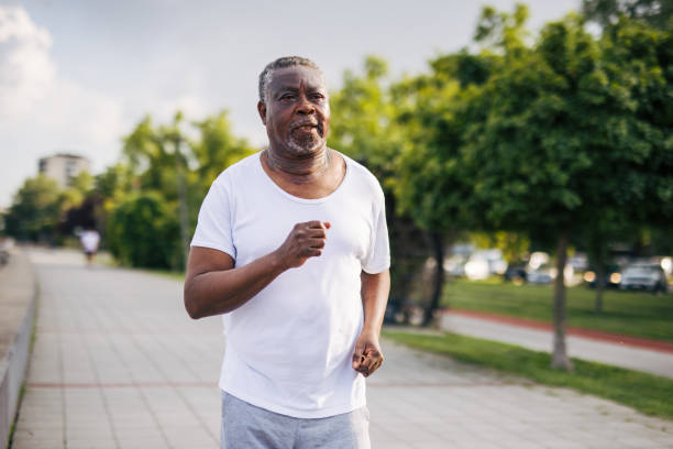 istock a senior black african man training outside 2156000727
