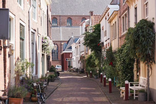 istock A city street between buildings during the summer 2156005329
