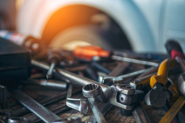 istock Mechanic tools engineering equipment car auto repair shop with copy space. Blurred background mechanical service. Heavy screw grungy rusted wrenches dirty screwdriver object. Industrial hardware set 2156006633