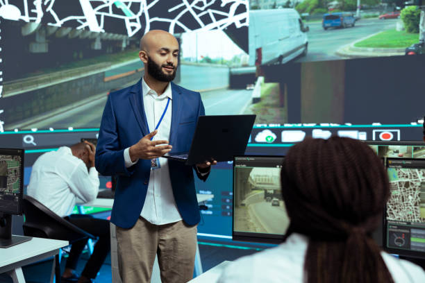 istock Middle eastern team leader instructing staff to track and trace delivery trucks 2156007823