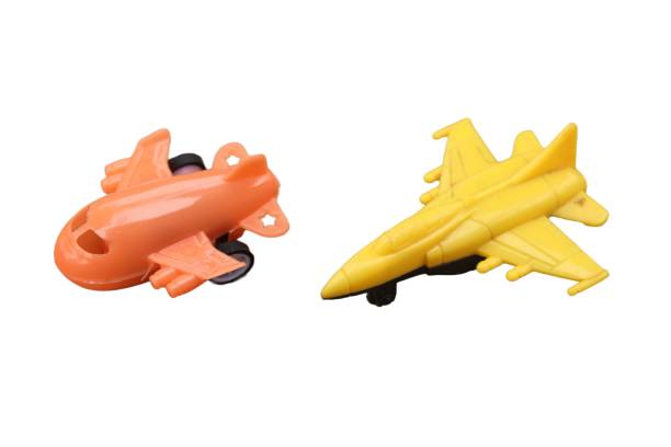 fighter planes and toy airplanes in yellow and orange isolated on white background