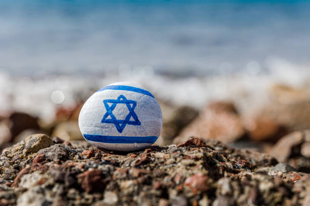 istock Rock painted with israeli flag 2156008614