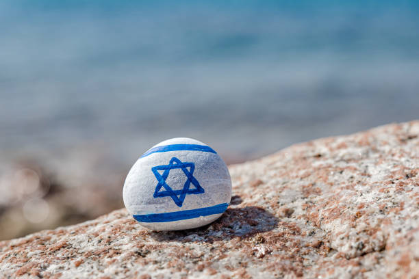 istock Rock painted with israeli flag 2156008848
