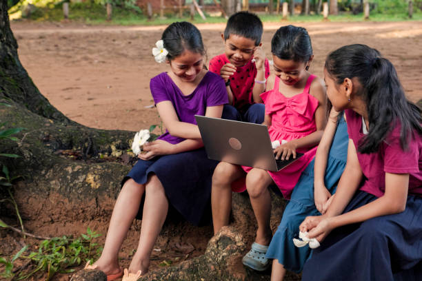 istock Cambodian children using laptop in village, Cambodia 2156009883
