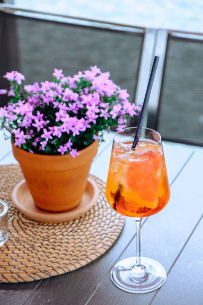 istock A glass of refreshing summer drink Aperol stands on the table. 2156010945