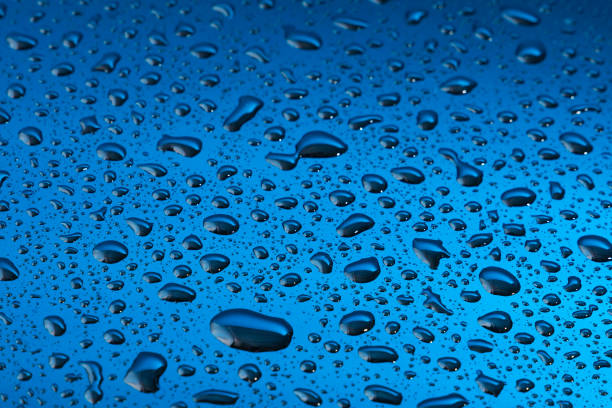 istock Water drops on blue reflective background - Art for decoration 2156011122