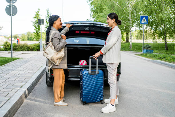 istock Two businesswomen going on a business trip 2156011274