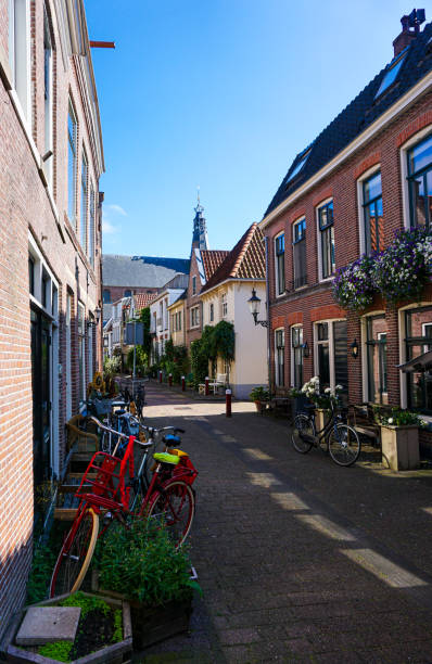 istock A city street between buildings during the summer 2156012620