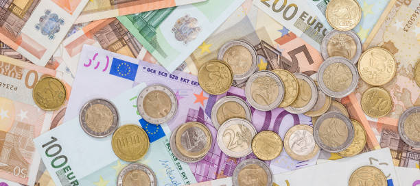 istock different euro paper note with metal cents coins 2156013276