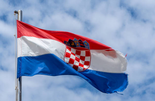istock Wind damaged and battered Croatian National flag 2156016035