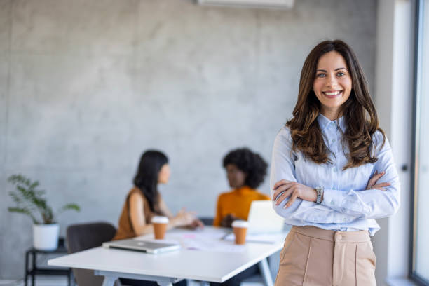 istock Confident Businesswoman in Modern Office Setting 2156017639