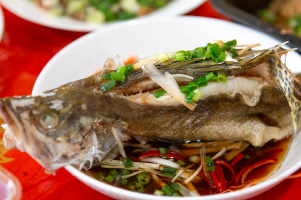 istock Steamed sea fish on the dining table 2156020101