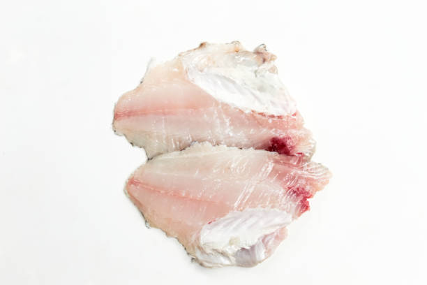 istock raw fish fillet meat isolated on white background 2156020406