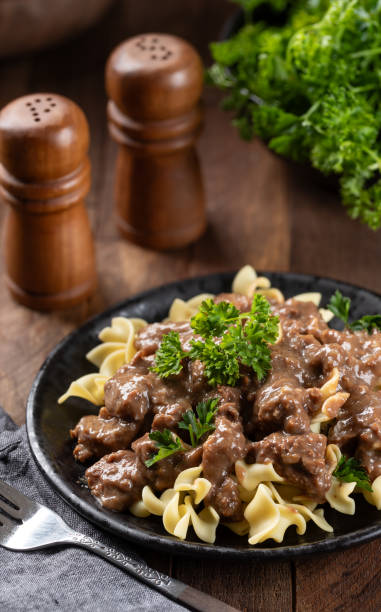 istock Beef stroganoff with egg noodles garnished with parsley 2156020688