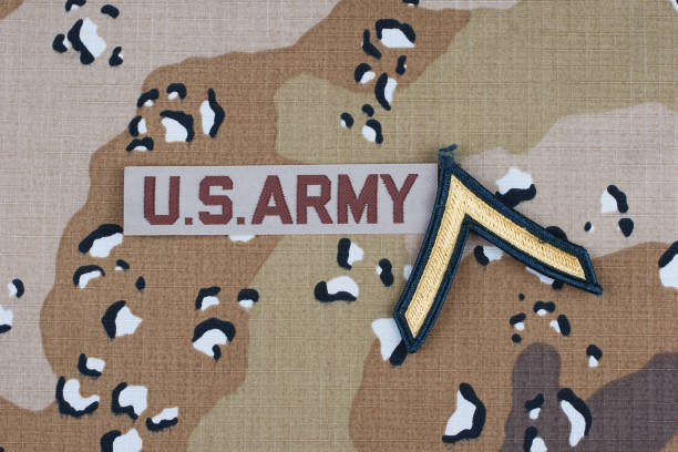 istock US ARMY desert uniform with private rank patch 2156023942